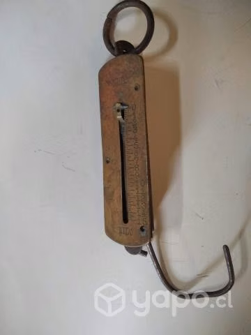 Pesa antigua de bronce
