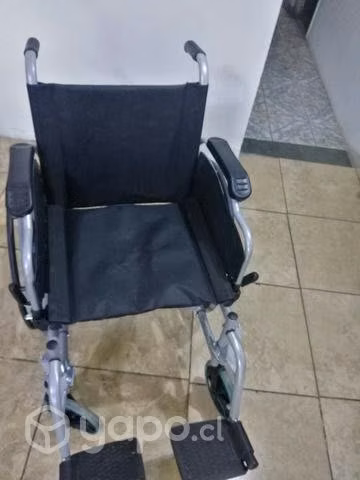 Silla de ruedas casi nueva