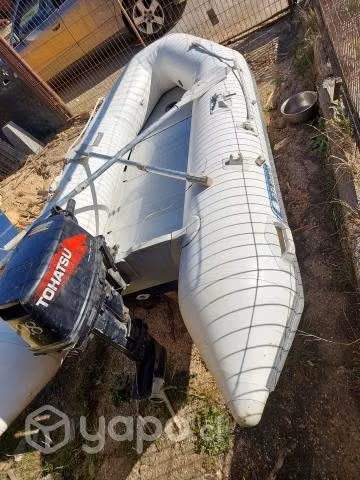 Bote con motor 9.8 hp
