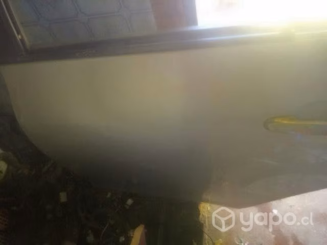 Puerta trasera lado copiloto new Yaris 2007