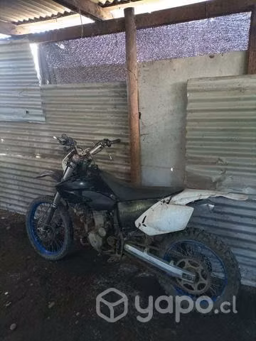 Moto de carrera, montaña, deportiva.Conversable