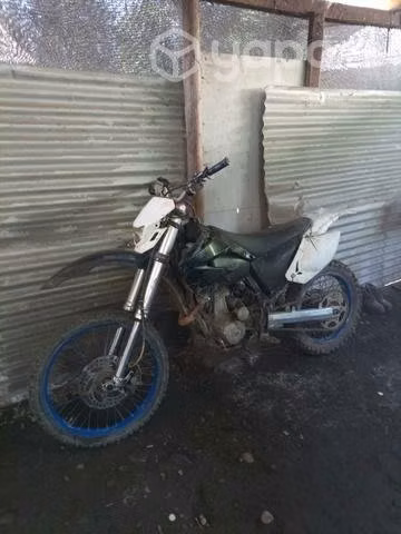 Moto de carrera, montaña, deportiva.Conversable