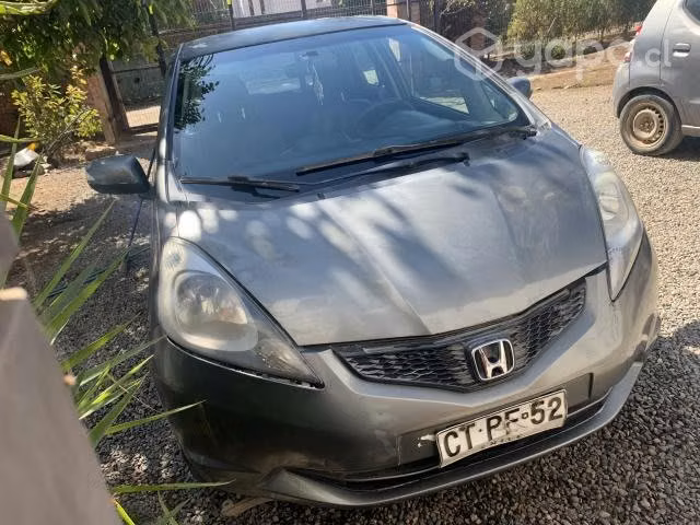 Vendo honda fit 2011 al día