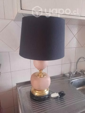 Una lampara bronce ceramica