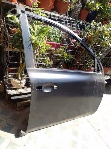 Puerta delantera derecha Nissan march ( nueva) - Imagen 2