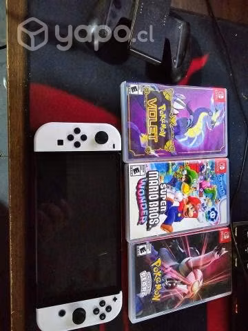 Nintendo switch oled con 3 juegos