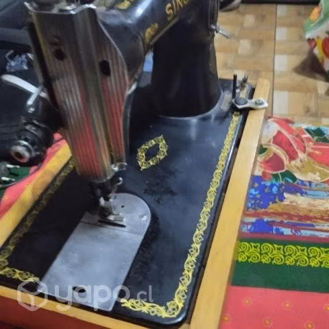 Hermosa Maquina de coser recta singer