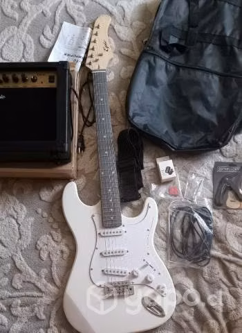 Se vende Pack guitarra electrica + amplificador