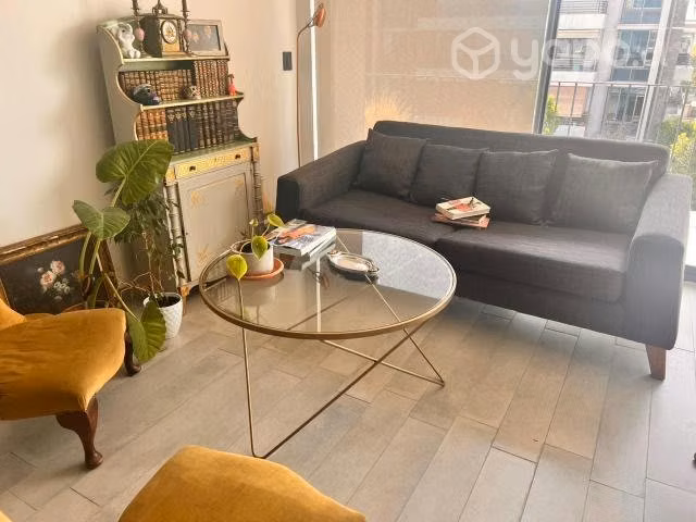 Mesa de Centro de vidrio con fierro dorado