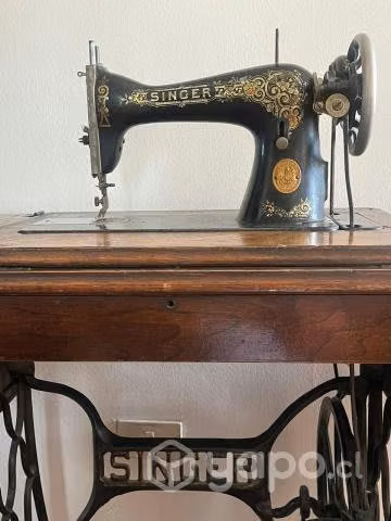 Maquina de cocer singer antigua impecable