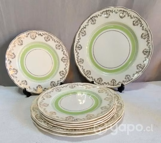 Bellos platos de porcelana bordes dorados Ingleses