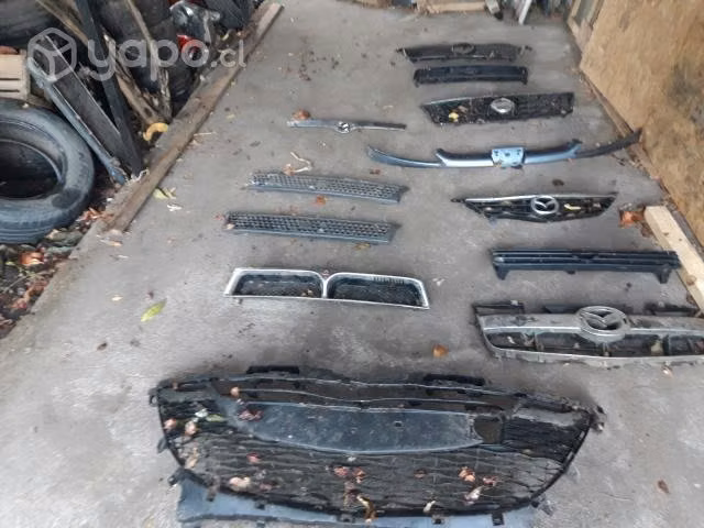 Mascara delantera original mazda 626 2002