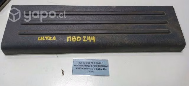 Tapiz Cubre Zocalo Trasero Izquierdo (MBD244) Mazd