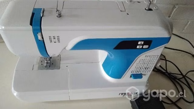 Maquina de coser magoya