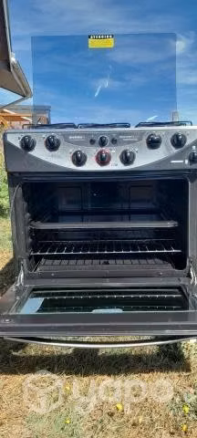 Estufa a gas 6 platos + campana solo un año de uso
