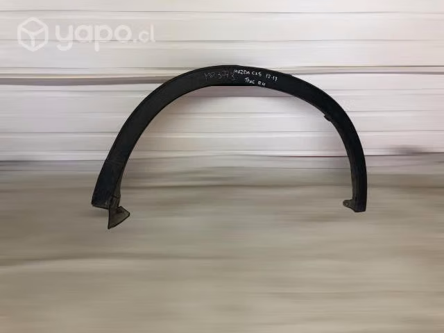 Moldura de rueda trasera rh mazda cx
