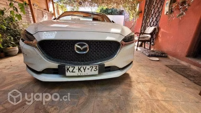 Busco repuesto automovil mazda
