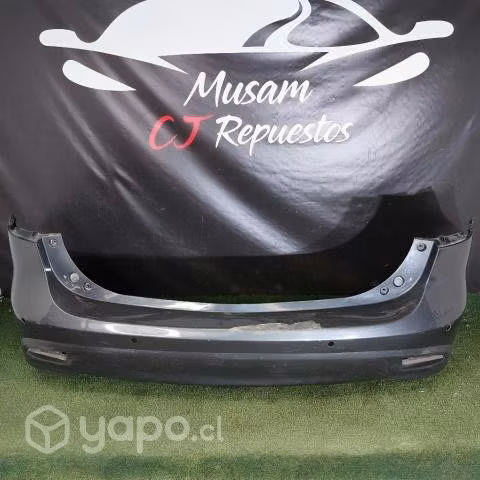 Parachoque trasero mazda  original deta