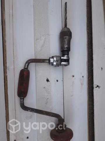 Taladro antiguo manual rojo