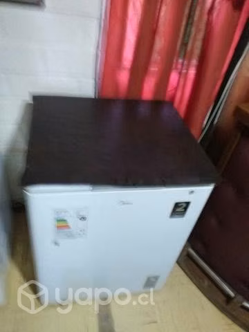 Congeladora mides 142 litros
