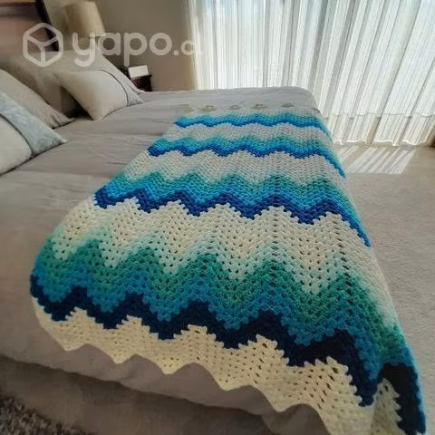 Manta o piecera tejida