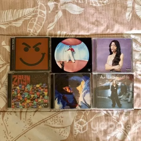 Discos de distintos cantantes y bandas