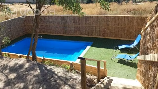 Venta de terreno 5000 metros, con 3 cabañas