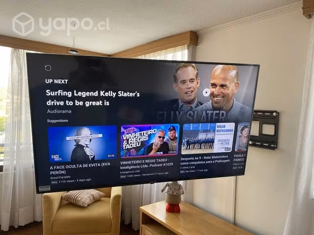 Televisor LG 60 4K con suporte de pared