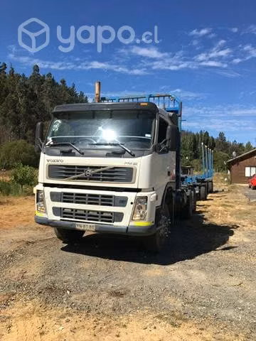 Camión Volvo 380 con carro
