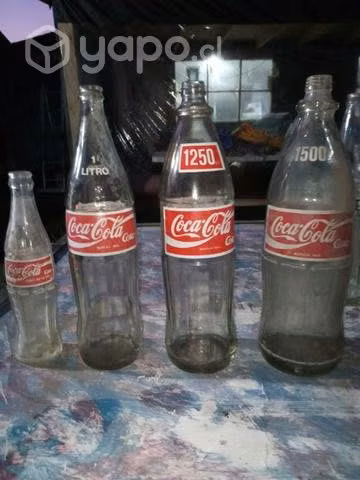 Colección de botellas de vidrio coca cola