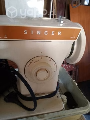 Maquina coser singer eléctrica