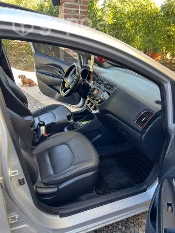 Kia río 5 sport top de línea
