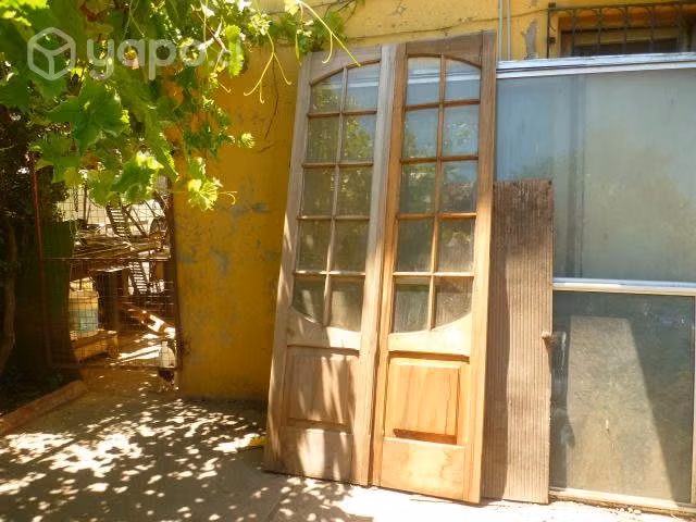Puerta doble hoja con vidrios biselados