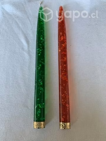 Dos velas de adorno con brillos en su interior
