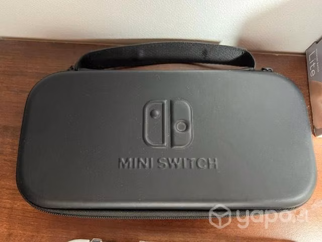 Nintendo Switch Lite + Caja + Estuche y Case