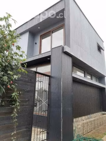 Casa con local comercial