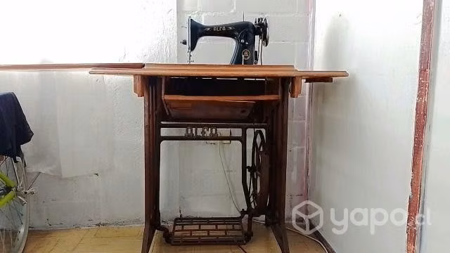 Maquina de coer singer