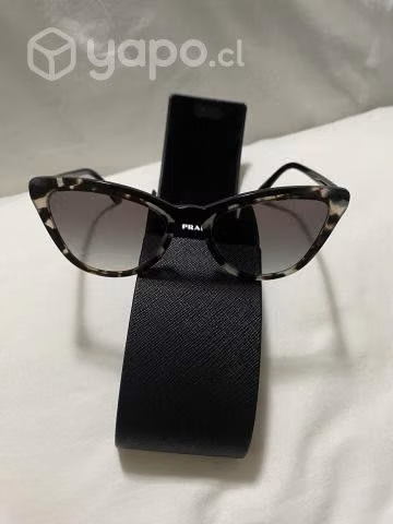 Lente de sol Prada