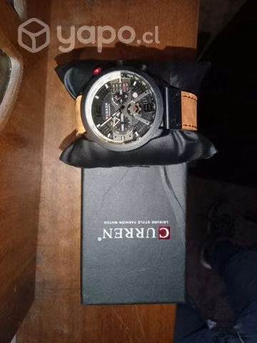 Reloj curren