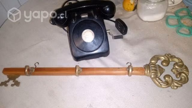 Perchero colgador en bronce mide 60 cms