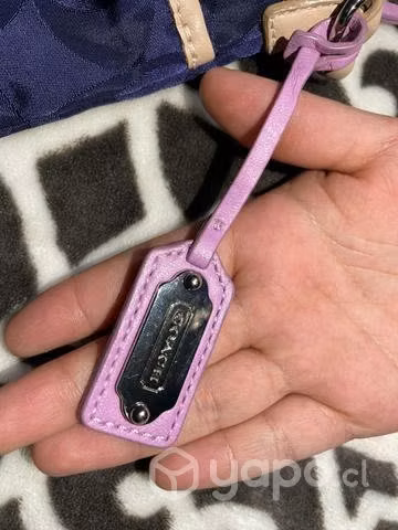 Cartera coach se vende ,o se permuta