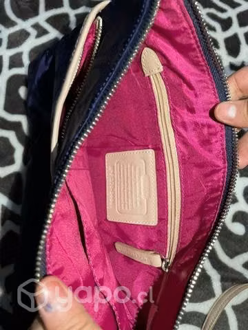Cartera coach se vende ,o se permuta