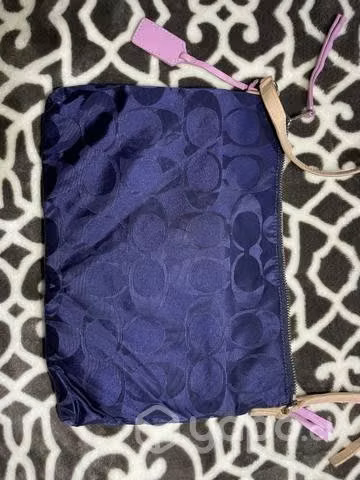 Cartera coach se vende ,o se permuta