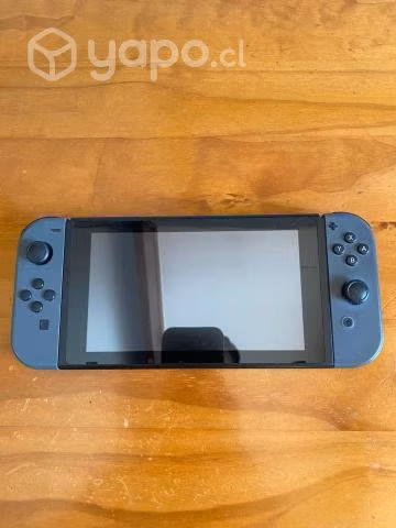 Nintendo Switch con control alambrico y 3 juegos