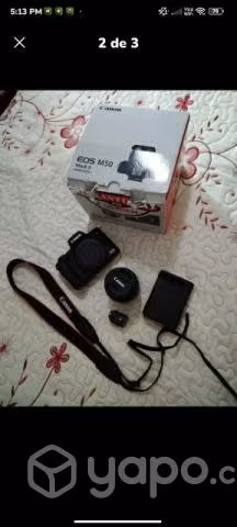 Camara canon y zapatos de seguridad