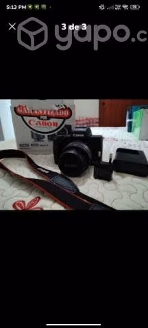Camara canon y zapatos de seguridad