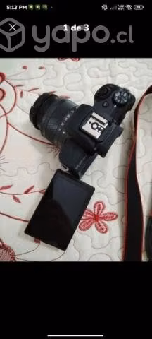 Camara canon y zapatos de seguridad