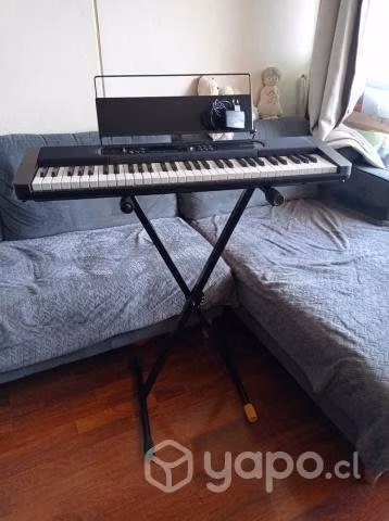 Teclado casio LK-S450 con atril y adaptador casio