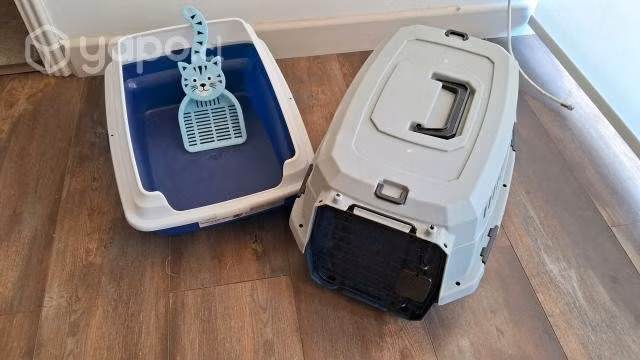 Caja de transporte y arenero.