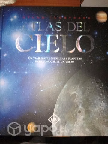Telescopio con libro atlas del universo